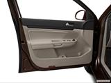  Inside of driver's side open door, window open photo